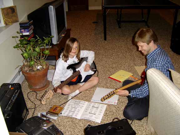 Students of all ages enjoy playing guitar